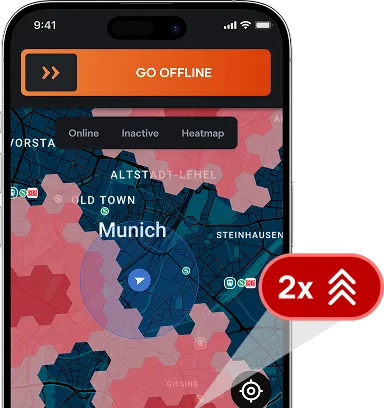 Driver app map of Munich with a high-demand price zone marked 2x