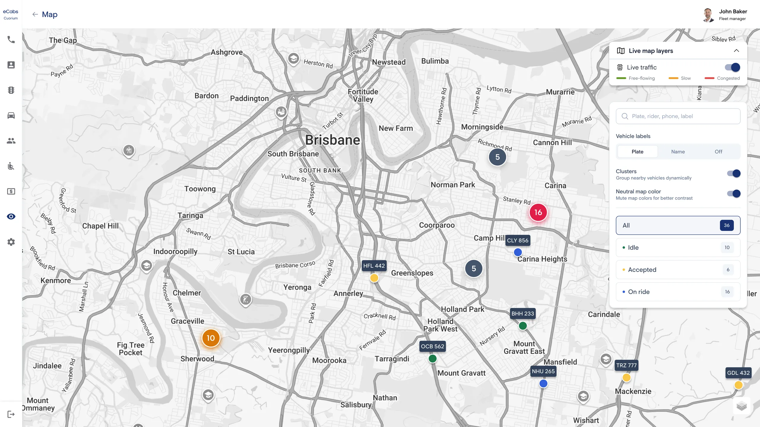 eCabs Technologies dispatch portal on a wide monitor: a live map with vehicles by status, live traffic and map layers