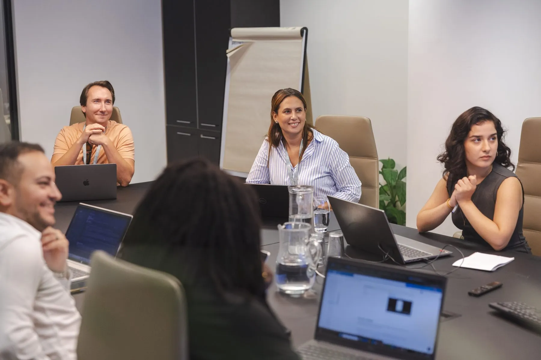 A meeting in one of the office meeting rooms